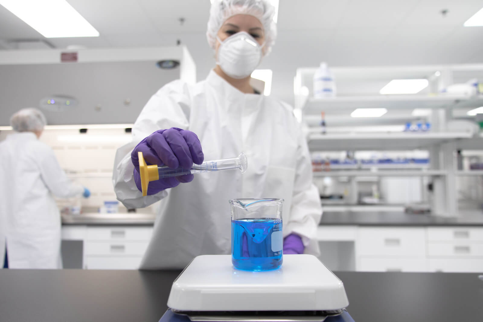 A PCCA pharmacist at work in the lab