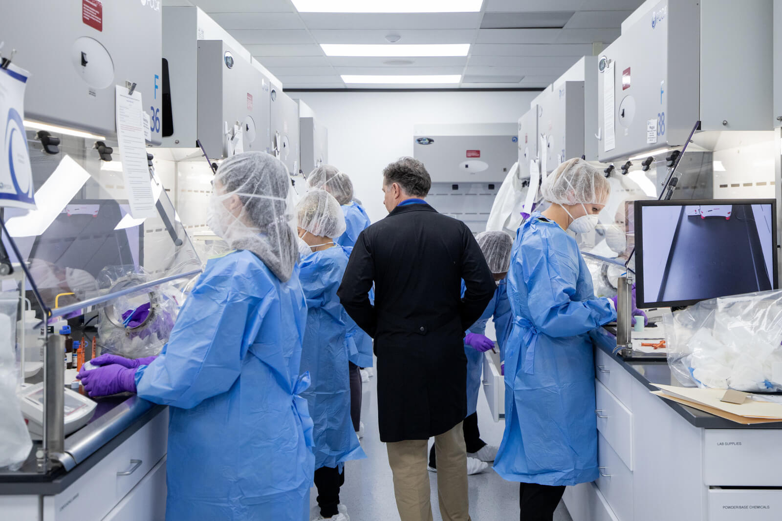 Pharmacists in hands-on compounding training
